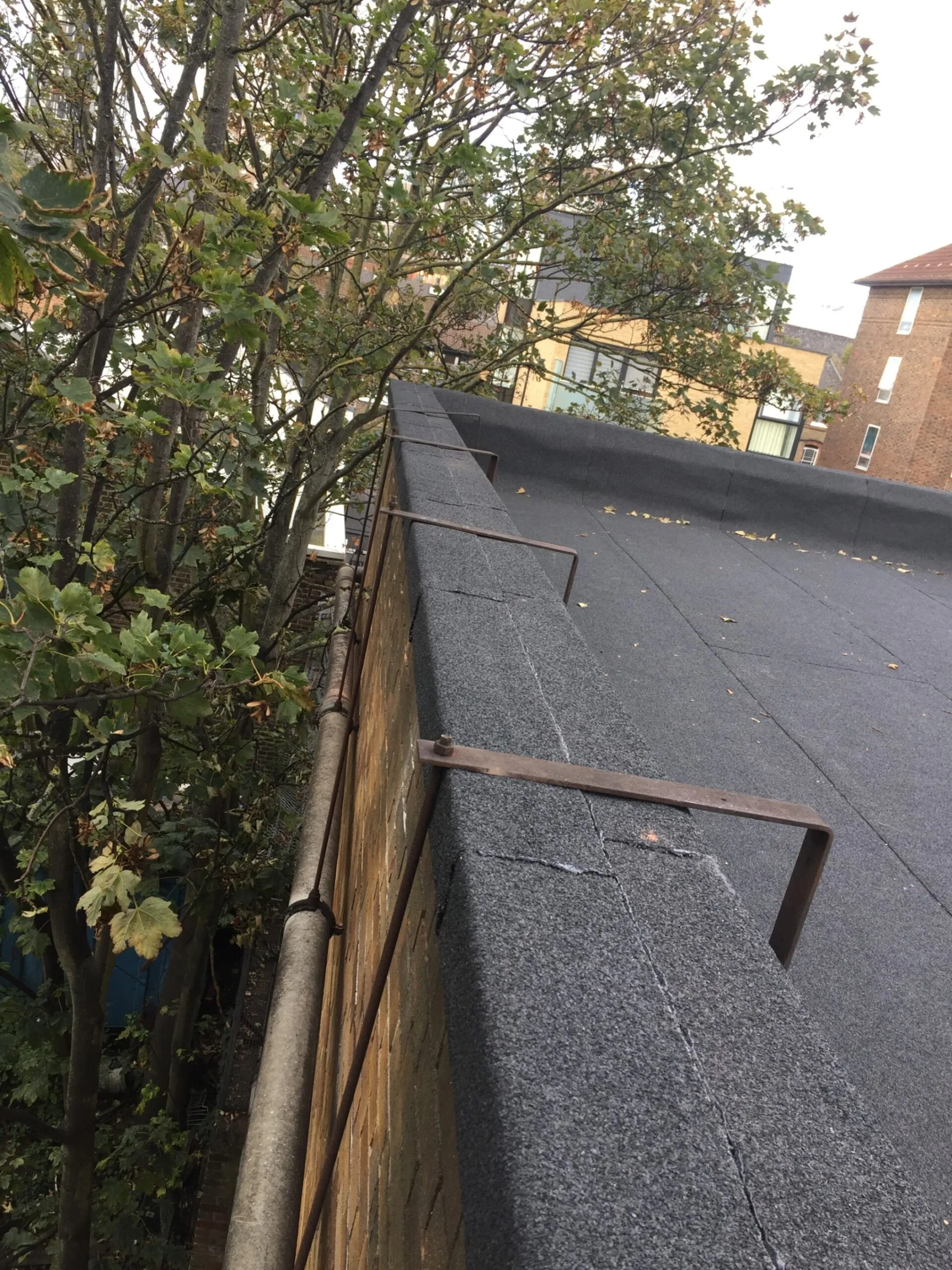single ply flat roof on apartment block.