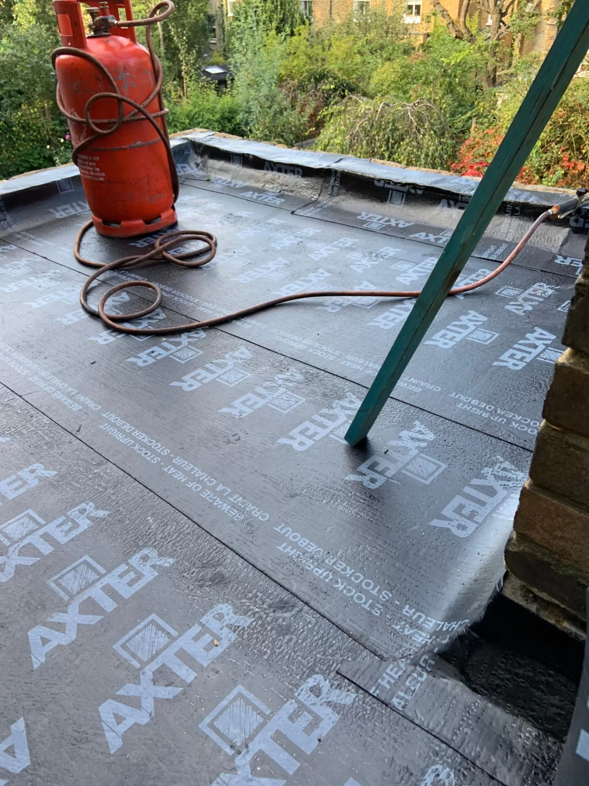 flat roofing in progress.
